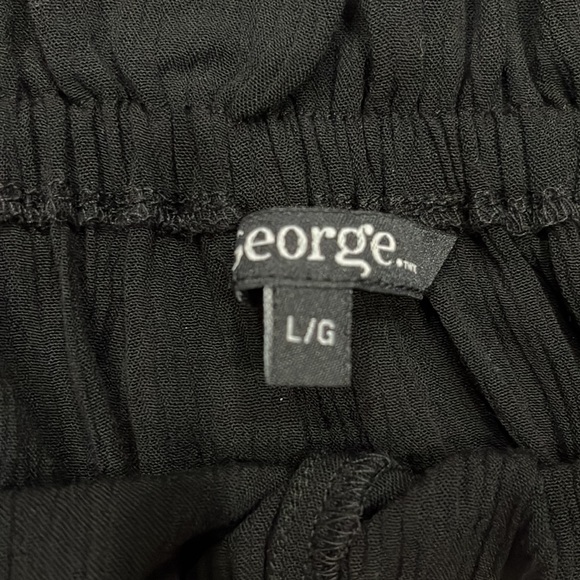 Black flowy off the shoulder blouse - Picture 2 of 2